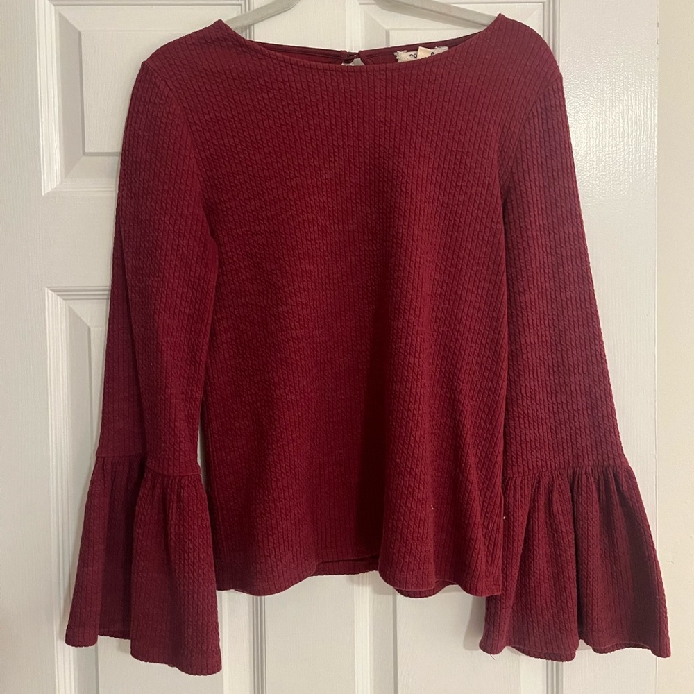 Maroon/red Anthropologie top with bell sleeves